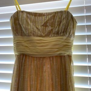 Gorgeous in yellow gold, strapless maxi length